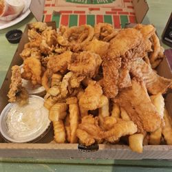 McMenamy Seafoods - Captain's Platter....huge whole belly clams, scallops,  shrimp,  and cod.....fries and onions rings