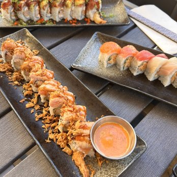 Pier 50 Sushi - Folsom - Lazy Dog Roll (spicy/bqq sauce on side), middle is Spicy Rainbow Roll and very back is, Fukumi Roll ! - Sushi Bars Near Me - Folsom, California