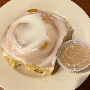 Henry's Diner - a cinnamon roll with icing - Diners Near Me - Crescent, Iowa