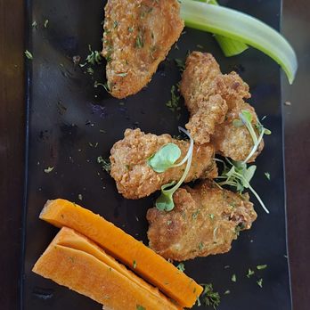 Mojitos Restaurant Bar - Happy Hour deeply breaded wings with no meat - Latin American Near Me - Jackson Heights, New York Mojitos Restaurant Bar - Happy Hour deeply breaded wings with no meat - Latin American Near Me - Jackson Heights, New York