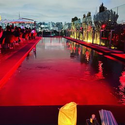 Pool area of the rooftop bar.  Bring a sweater for after hours.