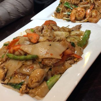 Thai Orchid - Pad see ew with shrimp and pad Thai with chicken in the back - Thai Near Me - Plainfield, Indiana