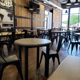 This place is SPACIOUS! This is only one of several rooms, plys an upstairs, plus outdoor seating.