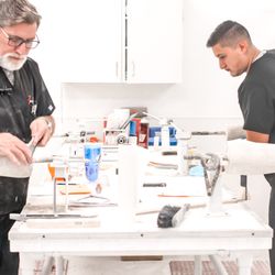 Westcoast Brace & Limb - Plaster Molds being used to create orthotic and prosthetic devices in our on-site fabrication lab