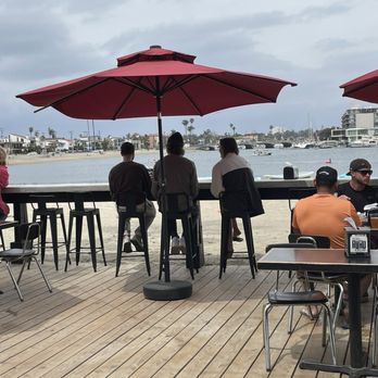 Grill 'Em All - Outside downstairs patio. - Burgers Near Me - Long Beach, California