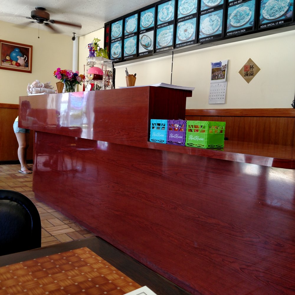 the front desk and dining area the front desk and dining area