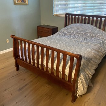 Factory Direct Floor Store - a bed in a bedroom - Flooring Near Me - San Diego, California