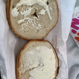 two sandwiches with cream cheese on them two sandwiches with cream cheese on them