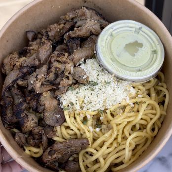 Saiga Vietnamese Eatery - Garlic noodles with pork belly -- that green aioli sauce is literally fire! Like a medium spicy but so addicting! - Vietnamese Near Me - Irvine, California