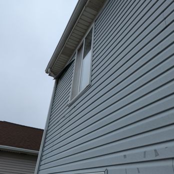 Maintenance Master - Loose siding panels at the top of the house. - Handyman Near Me