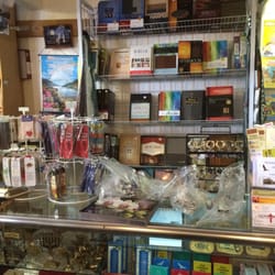 Libreria Cristiana Palabra De Dios - Study bibles behind the bookmark counter.