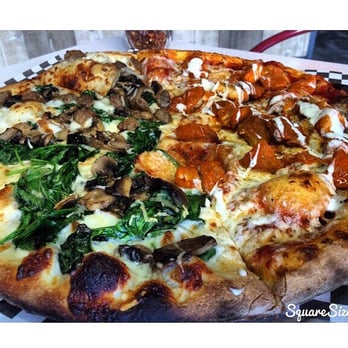 Plank 47 - half buffalo chicken/half spinach, mushrooms and different cheeses... ALL delicious! - Pizza Near Me - Los Angeles, California Plank 47 - half buffalo chicken/half spinach, mushrooms and different cheeses... ALL delicious! - Pizza Near Me - Los Angeles, California