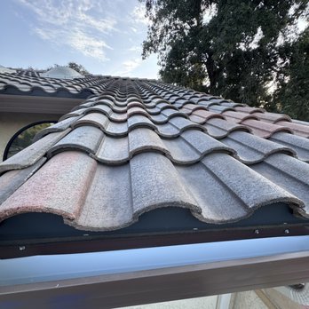 Universal Roofing - New Spanish tiles on second floor - Roofing Near Me
