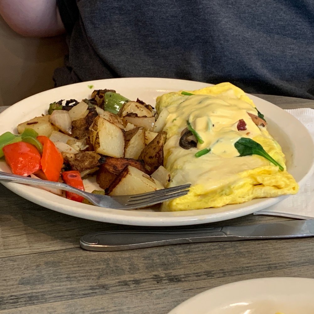Eggs N Things - a plate of food on a table - Breakfast & Brunch Near Me - Simi Valley, California Eggs N Things - a plate of food on a table - Breakfast & Brunch Near Me - Simi Valley, California