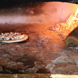 Pogacha Restaurant & Bar - Pogacha pizza in the applewood fired oven (Peka)