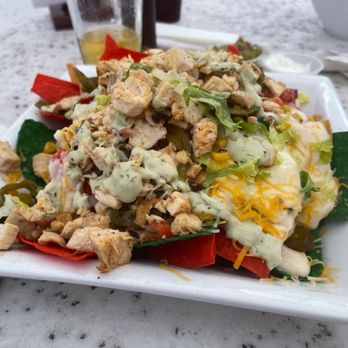 Hogan's Hangout - Loaded Nachos with chicken (from a can) - Sports Bars Near Me - Clearwater, Florida Hogan's Hangout - Loaded Nachos with chicken (from a can) - Sports Bars Near Me - Clearwater, Florida