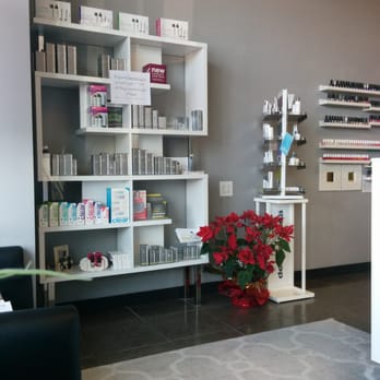My Spa Lounge - Waiting. Product wall with specials sign. - Nail Salons Near Me - Houston, Texas My Spa Lounge - Waiting. Product wall with specials sign. - Nail Salons Near Me - Houston, Texas
