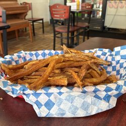 Franklin's Famous Cheesesteak Company - Large fry 1/2 eaten.