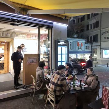 Swiss Chuchi - People dinning outside - Fondue Near Me - Zürich, ZH Swiss Chuchi - People dinning outside - Fondue Near Me - Zürich, ZH