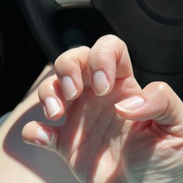 Scratches visible on nails