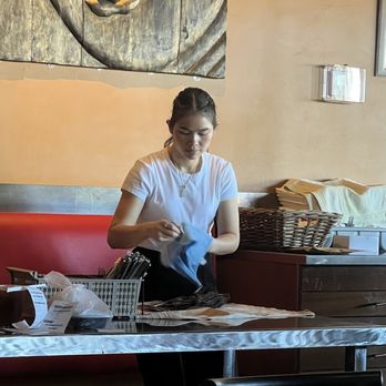 Yupha's Thai Kitchen - Ambience has a wonderful THAI theme throughout the restaurant. Working staff wiping and cleaning. - Thai Near Me - Tempe, Arizona