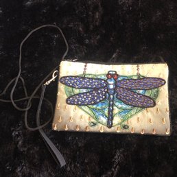 Cute little dragonfly cross body! I've received compliments galore on this bag! Cute little dragonfly cross body! I've received compliments galore on this bag!