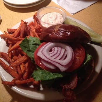 Goldbergs in Dundee - Bacon burger on pretzel bun with sweet potato fries. - American Near Me - Omaha, Nebraska Goldbergs in Dundee - Bacon burger on pretzel bun with sweet potato fries. - American Near Me - Omaha, Nebraska