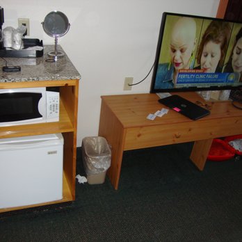 White Oak Inn & Suites - Front of our room - mini fridge, microwave, coffee, TV, & tables. - Hotels Near Me - Deer River, Minnesota White Oak Inn & Suites - Front of our room - mini fridge, microwave, coffee, TV, & tables. - Hotels Near Me - Deer River, Minnesota