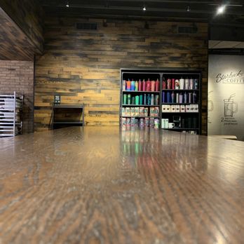 Starbucks - a coffee shop with a large wooden table - Coffee & Tea Near Me - West Lafayette, Indiana Starbucks - a coffee shop with a large wooden table - Coffee & Tea Near Me - West Lafayette, Indiana