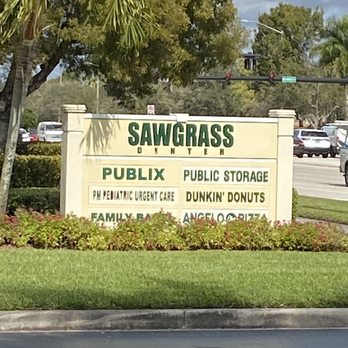 Sawgrass Center - Street sign - Shopping Centers Near Me - Coral Springs, Florida Sawgrass Center - Street sign - Shopping Centers Near Me - Coral Springs, Florida