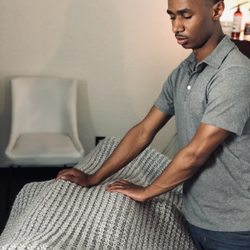 Infinity Massage & Bodywork - Reiki is an ancient Japanese healing art that is administered through the hands via light touch to harmonize the body's energy.