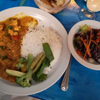 Aux Îles Bleues - a plate of food with rice and vegetables - Cajun/Creole Near Me - Montreal, Quebec