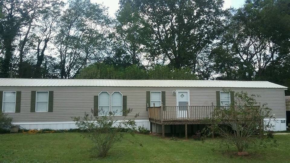 Slide of Burkett Brothers Metal Roofing