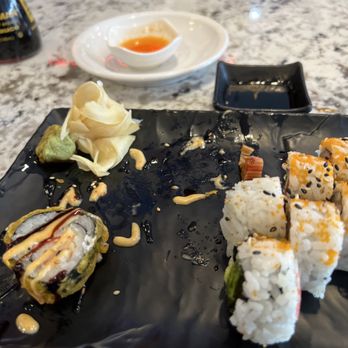 One19 North Main - Half Crunchy roll almost gone and a California Roll - Thai Near Me - Mount Holly, North Carolina One19 North Main - Half Crunchy roll almost gone and a California Roll - Thai Near Me - Mount Holly, North Carolina