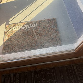 Coastal House Cleaning - Glass front door, dirty. I realize "glass doors" isn't specified in their list, but seems like a standard item. - Home Cleaning Near Me - San Diego, California