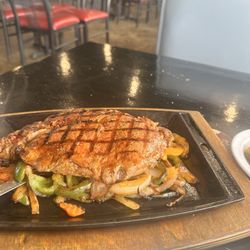 Casa Ortiz - My steak minus the 3 shrimp from the top. My steak was grilled, and not done on a flat top! Great grilled flavor!!!