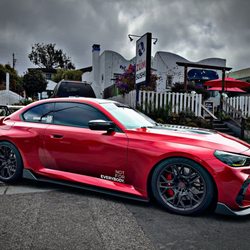 My wife's car is in front of our favorite sushi place in all the world. With their permission, we took our shots!