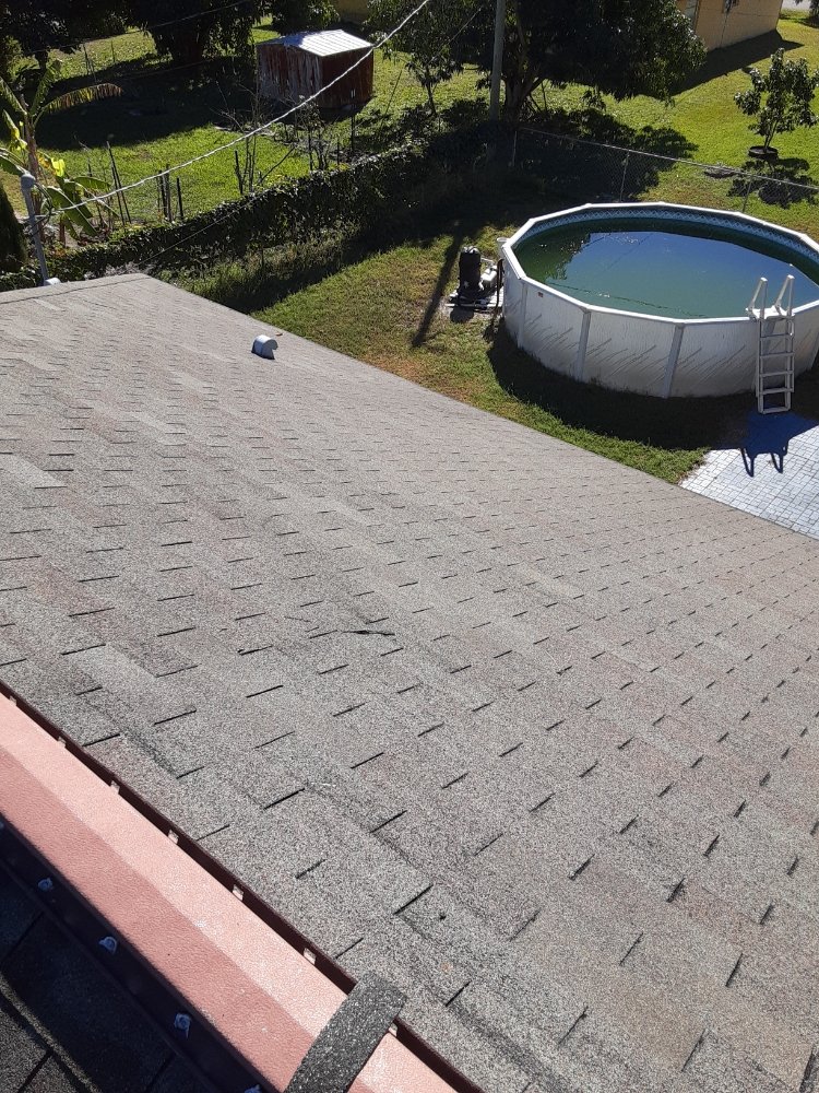 Slide of KJ Miller Roofing