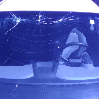 7-Eleven - a car with a broken windshield - Gas Stations Near Me - Arlington, Texas