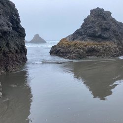 Myers Creek Beach - View of three sea stacks. I took this photo while standing on the wet sand.