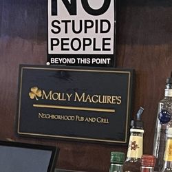 Molly Maguire's Neighborhood Pub and Grill - Funny sign.