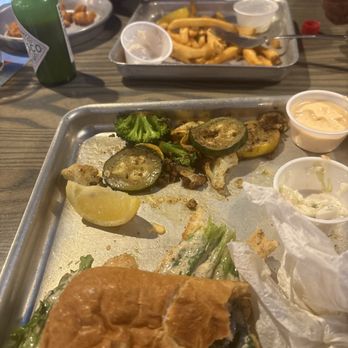 Shuckin' Shack Oyster Bar - Shrimp Po Boy,  Grilled veggies, coleslaw, fried cod and fried shrimp with fries - Seafood Near Me - Rocky Mount, North Carolina