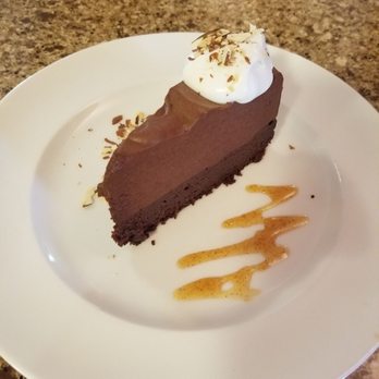 Hunt & Gather Restaurant - Chocolate Almond Torte with whipped cream - New American Near Me - Torrey, Utah Hunt & Gather Restaurant - Chocolate Almond Torte with whipped cream - New American Near Me - Torrey, Utah