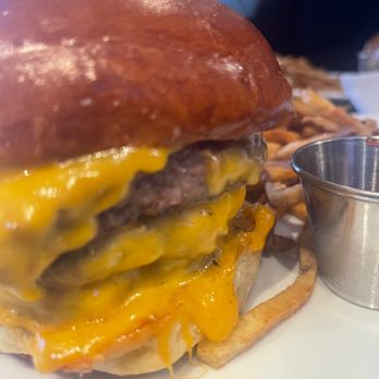 The Social - Triple burger and fries. - New American Near Me - Severna Park, Maryland The Social - Triple burger and fries. - New American Near Me - Severna Park, Maryland