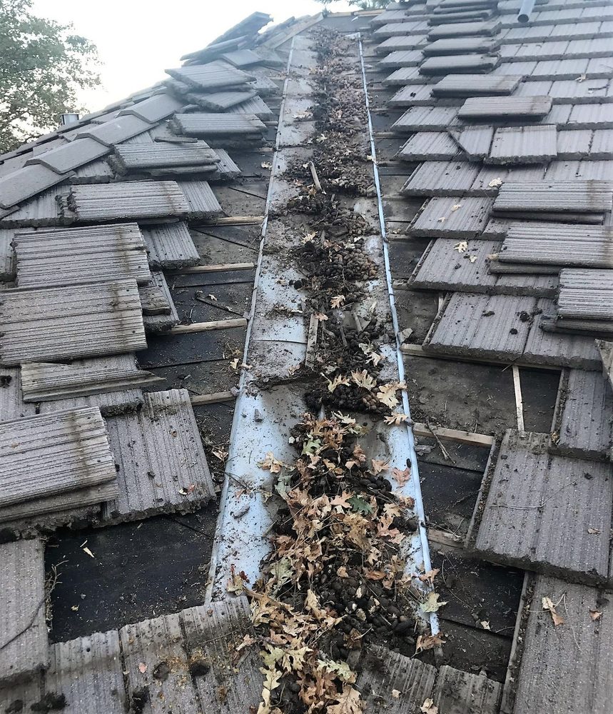 Slide of All Slopes Roofing