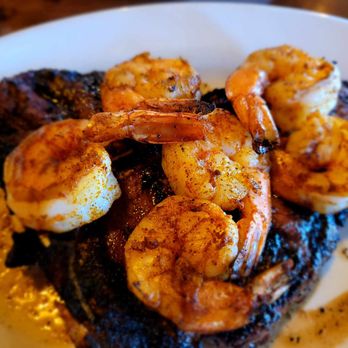 Bare Bones Steakhouse - T-Bone with a side of shrimp - Steakhouses Near Me - Buford, Georgia
