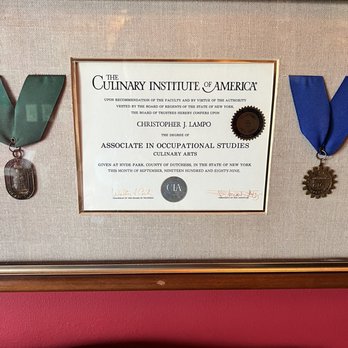 Christopher's World Grille - CIA diploma! Haven't seen one of those in a while :) - Seafood Near Me - Bryan, Texas