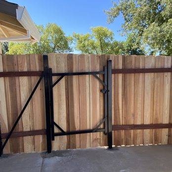 Unique Landscape - a wooden fence with a gate - Artificial Turf Near Me Unique Landscape - a wooden fence with a gate - Artificial Turf Near Me