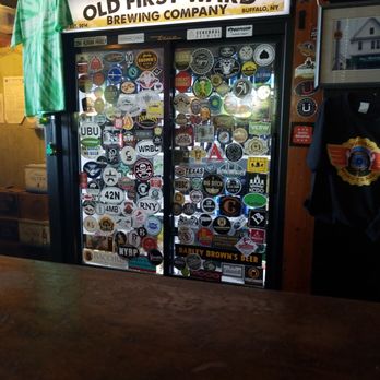 Gene McCarthy's - Their cooler filled with stickers! - American Near Me - Buffalo, New York Gene McCarthy's - Their cooler filled with stickers! - American Near Me - Buffalo, New York