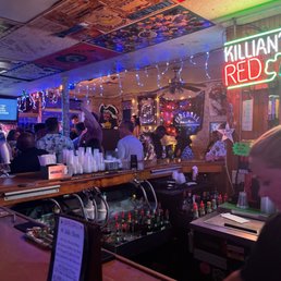 a bar filled with people a bar filled with people